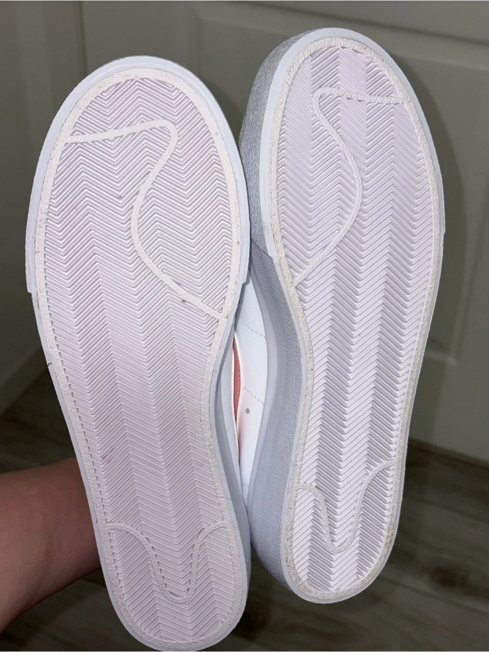 Nike Women's White Sneaker with Pink Swoosh